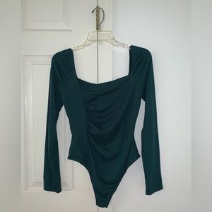 Green asymmetrical ruched bodysuit